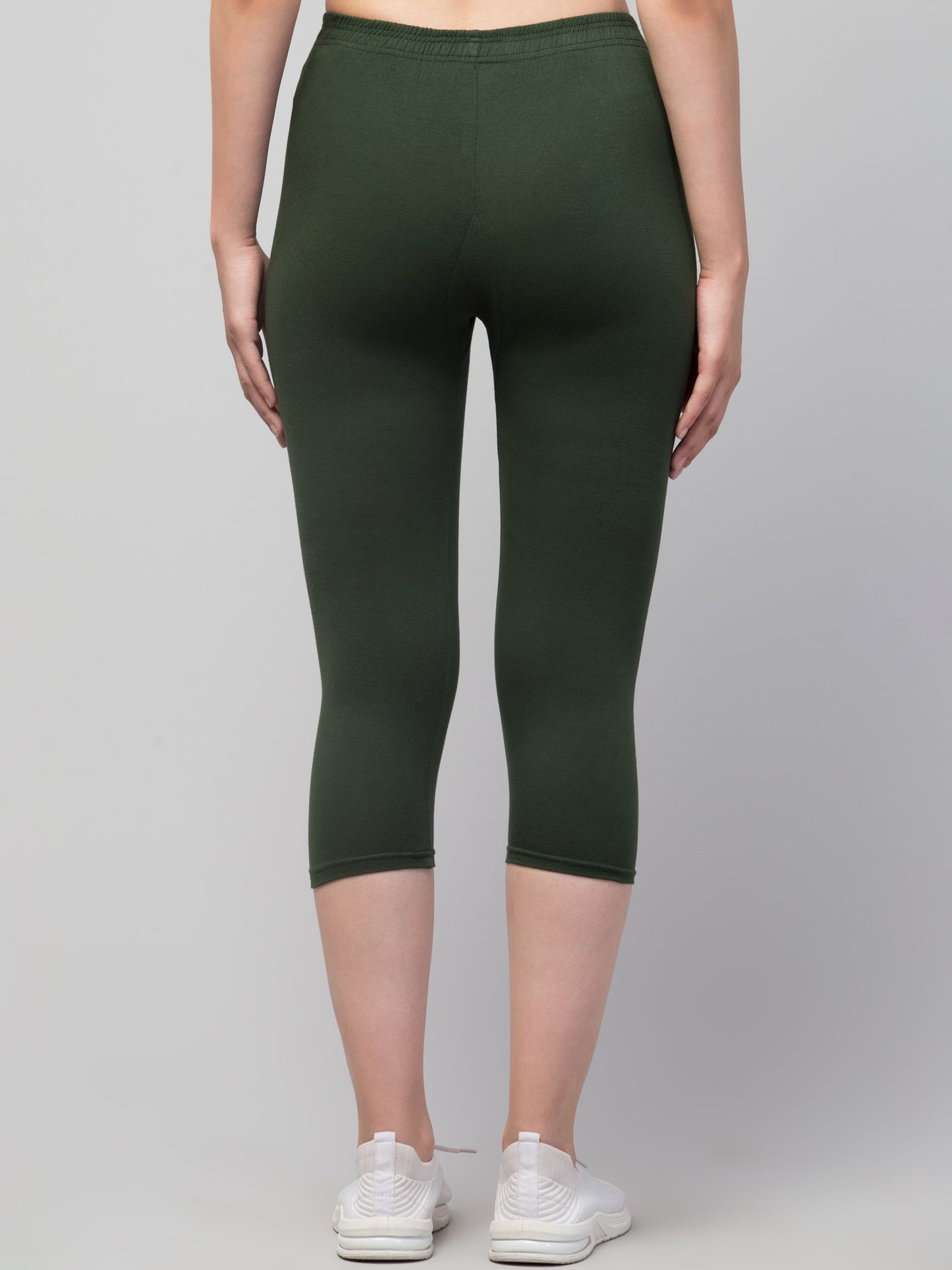 WOMEN SOLID OLIVE MID RISE SKINNY FIT CAPRIS