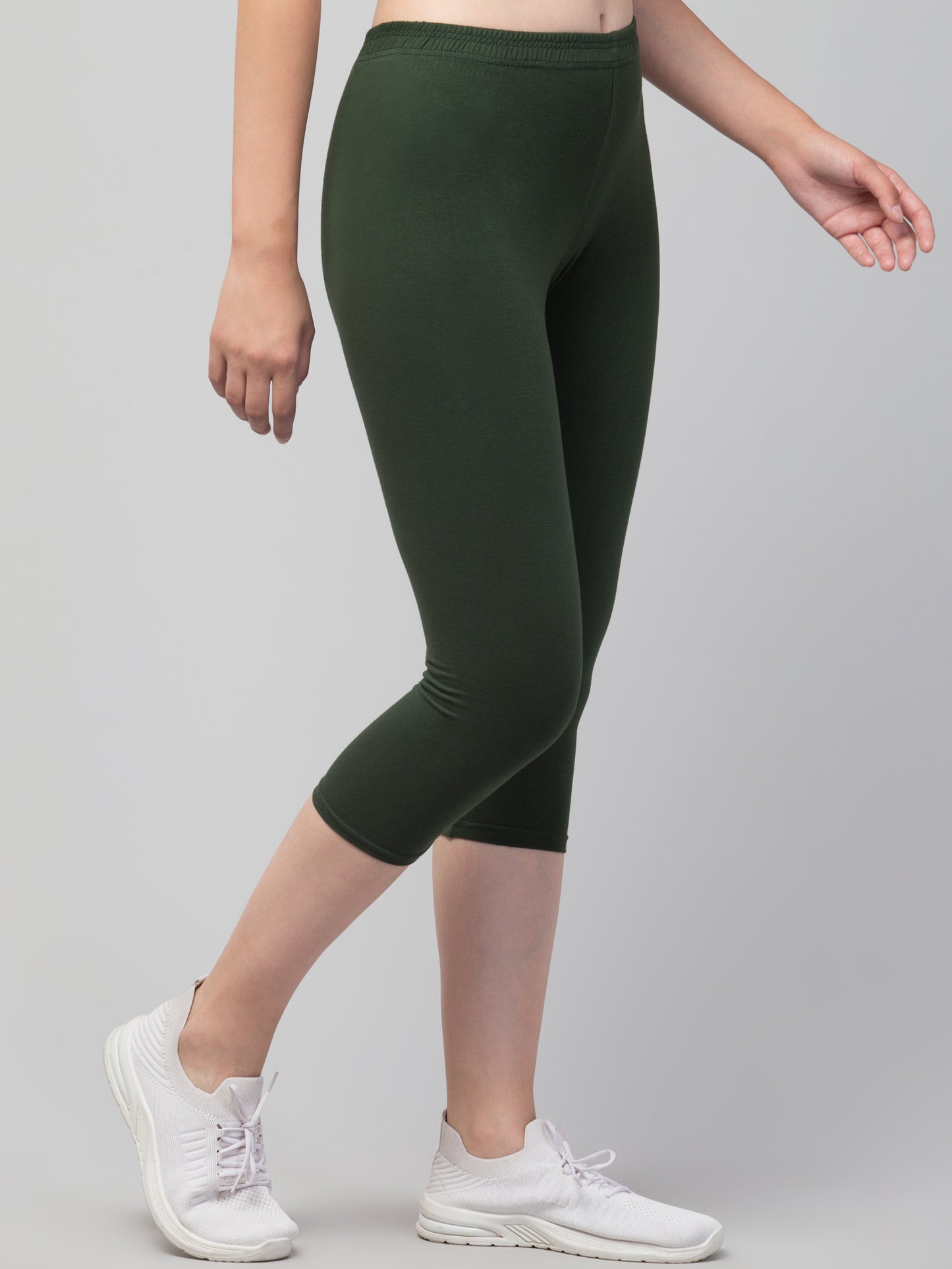 WOMEN SOLID OLIVE MID RISE SKINNY FIT CAPRIS