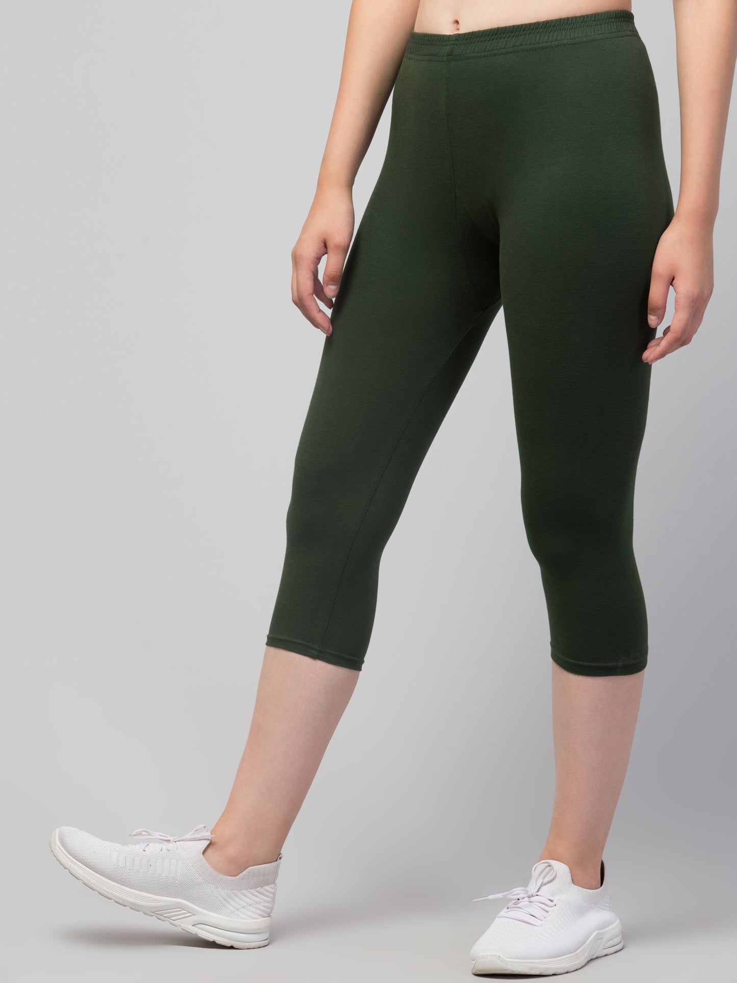 WOMEN SOLID OLIVE MID RISE SKINNY FIT CAPRIS