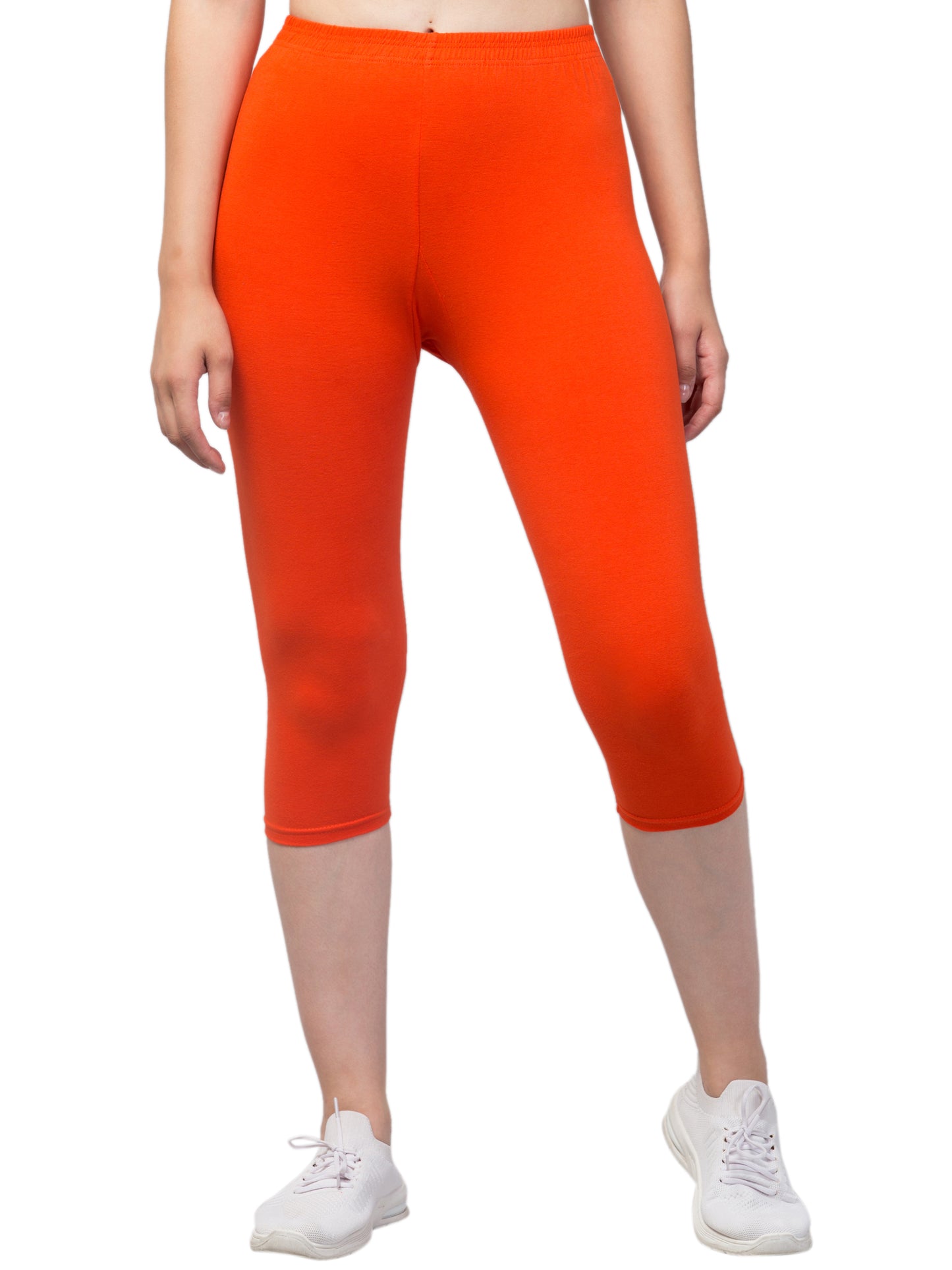 WOMEN SOLID DARK ORANGE MID RISE SKINNY FIT CAPRIS