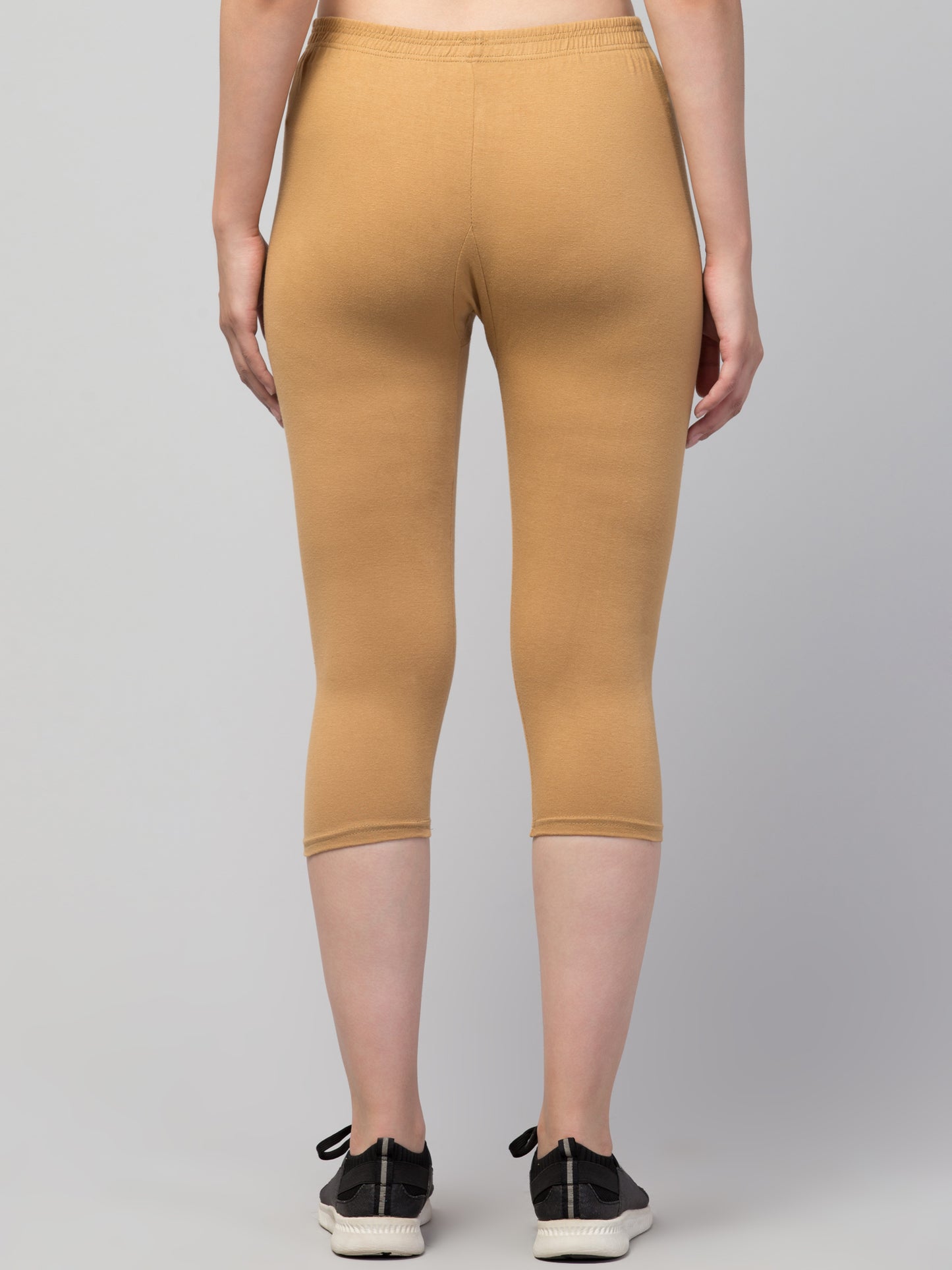 WOMEN SOLID CHIKU MID RISE SKINNY FIT CAPRIS