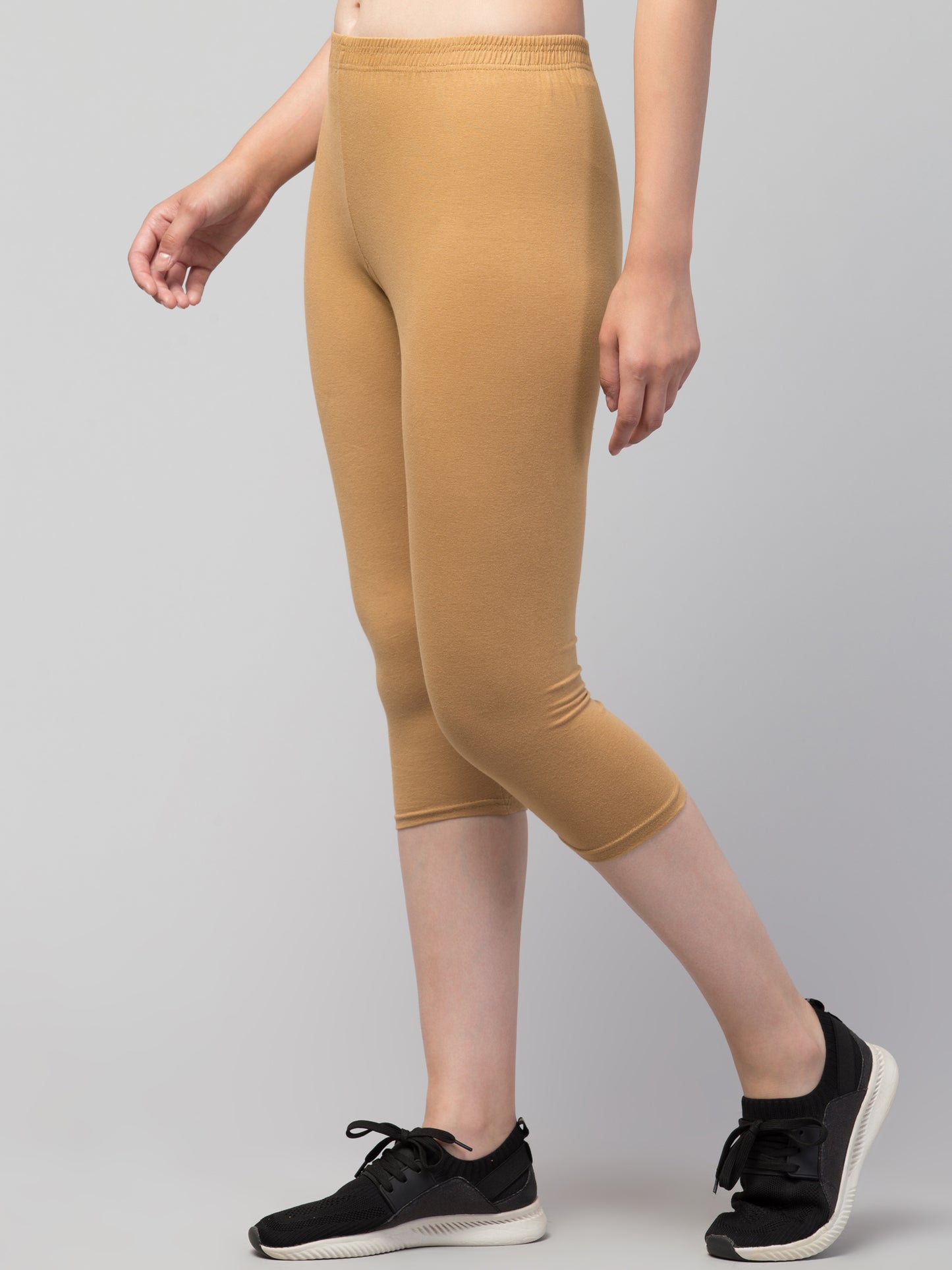 WOMEN SOLID CHIKU MID RISE SKINNY FIT CAPRIS