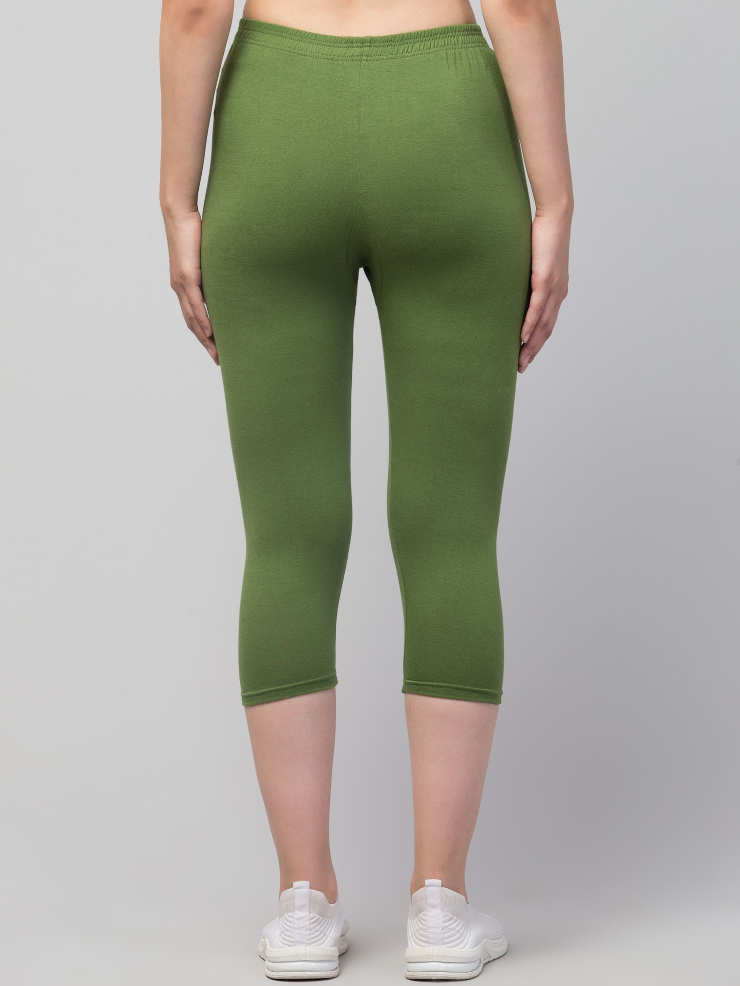 WOMEN SOLID DARK GREEN MID RISE SKINNY FIT CAPRIS