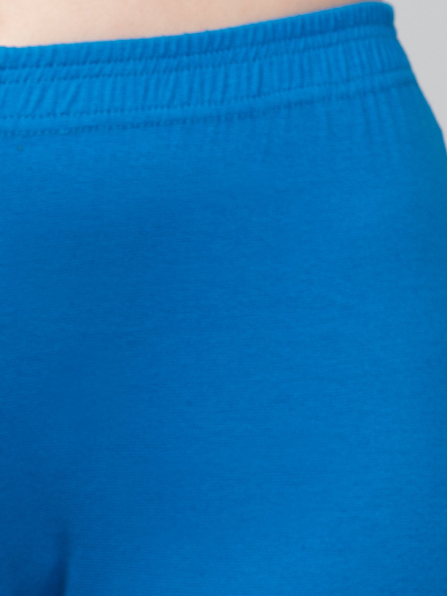 WOMEN SOLID BLUE MID RISE SKINNY FIT CAPRIS
