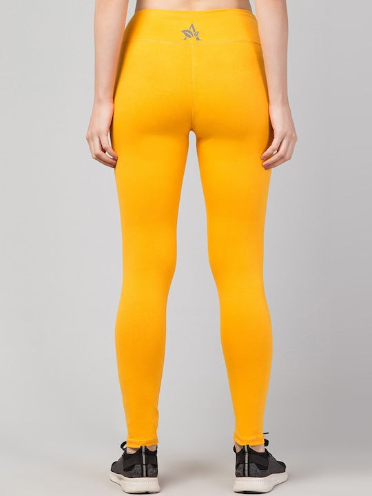 Women Solid Yellow Slim Fit Leggings