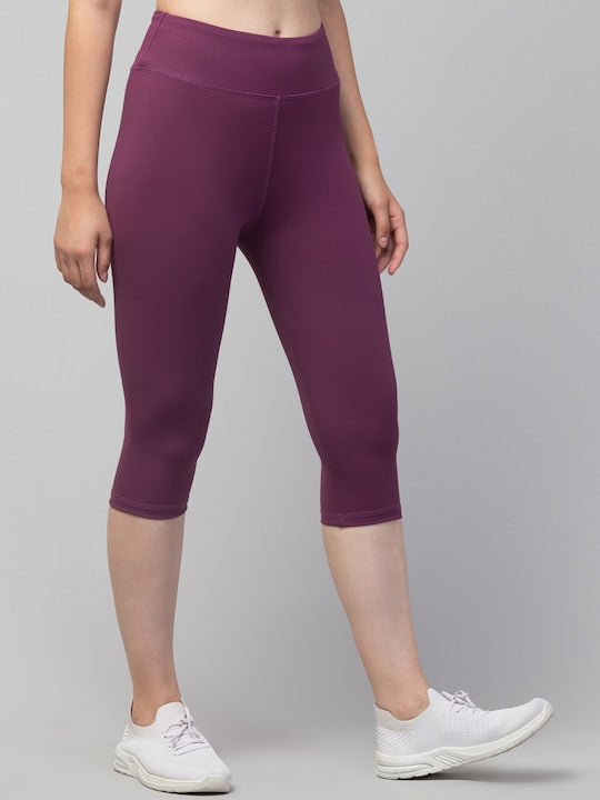 Women Purple Solid Dry Fit Yoga Capri Tights