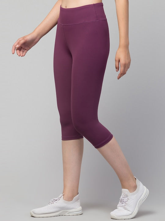 Women Purple Solid Dry Fit Yoga Capri Tights