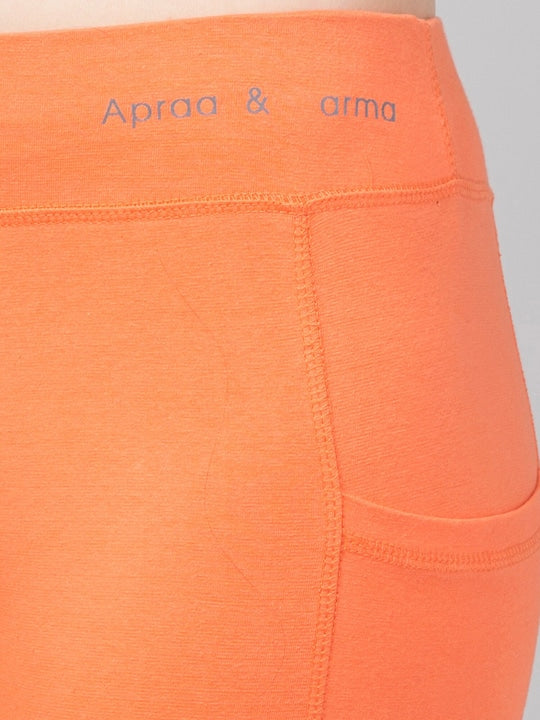 Women Solid Orange Slim Fit with pockets Leggings