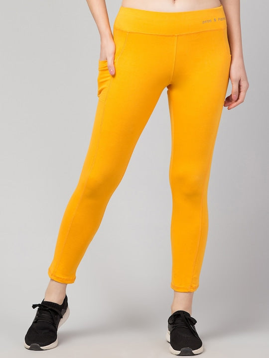Women Solid Yellow Slim Fit with pockets Leggings