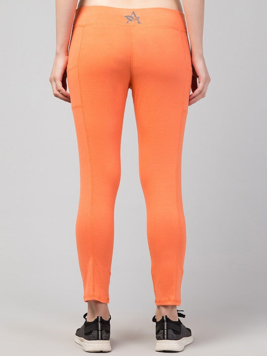 Women Solid Orange Slim Fit with pockets Leggings