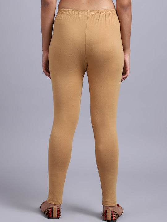 Women Solid Beige Mid-Rise Slim Fit Leggings