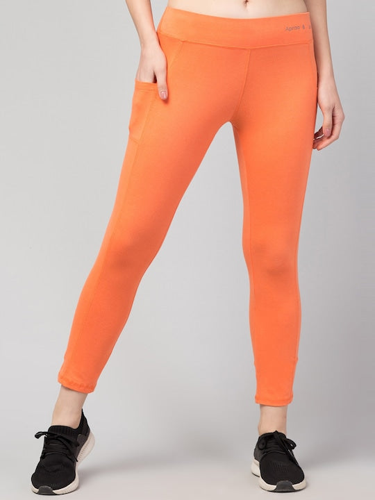 Women Solid Orange Slim Fit with pockets Leggings