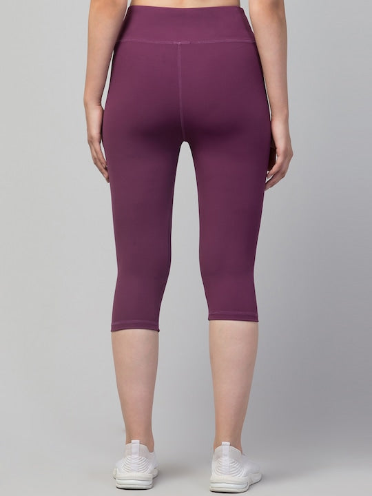 Women Purple Solid Dry Fit Yoga Capri Tights