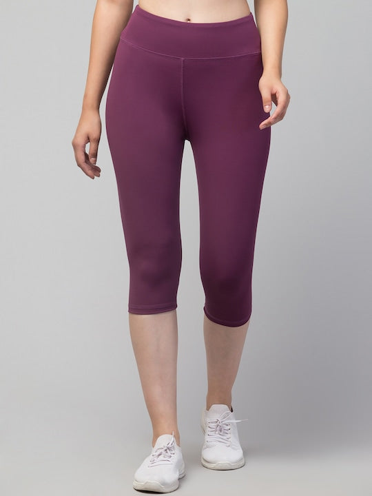 Women Purple Solid Dry Fit Yoga Capri Tights