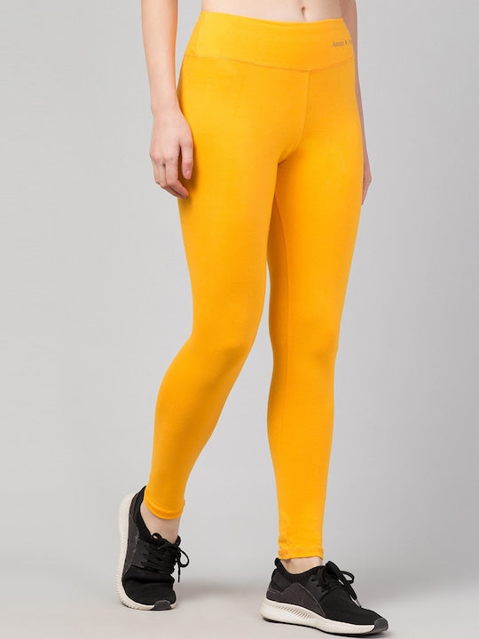 Women Solid Yellow Slim Fit Leggings