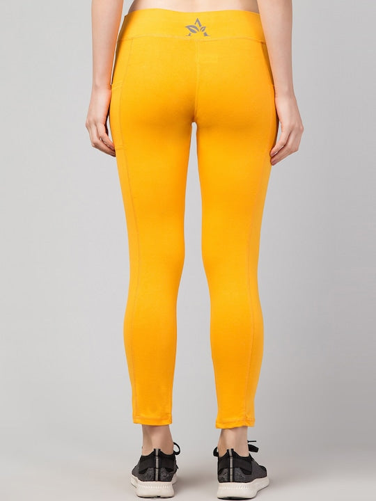 Women Solid Yellow Slim Fit with pockets Leggings