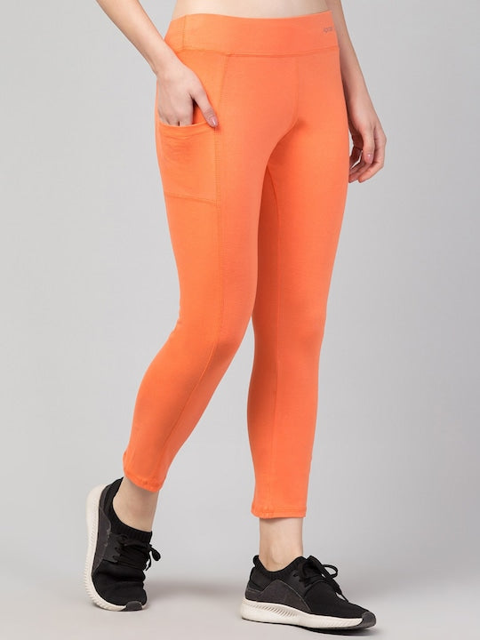 Women Solid Orange Slim Fit with pockets Leggings
