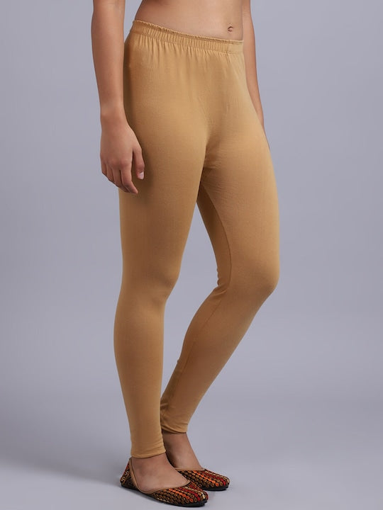 Women Solid Beige Mid-Rise Slim Fit Leggings