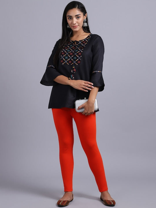 Women Solid Orange Slim Fit Leggings