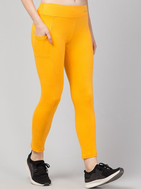 Women Solid Yellow Slim Fit with pockets Leggings