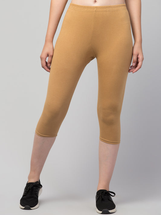WOMEN SOLID CHIKU MID RISE SKINNY FIT CAPRIS