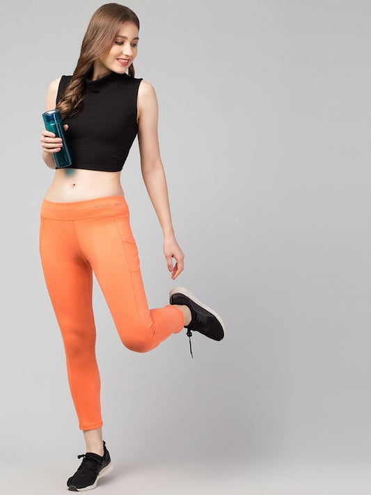 Women Solid Orange  Slim Fit with pockets Leggings