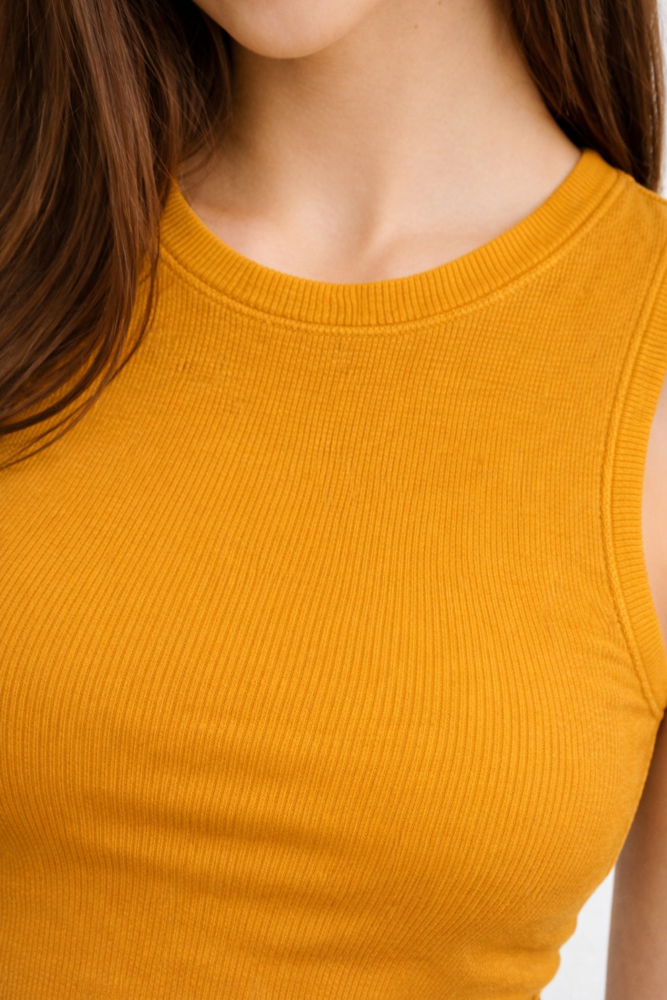 women’s solid mustard yellow sleeveless ribbed crop top